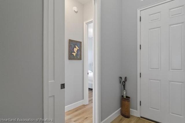 hall with light wood-type flooring