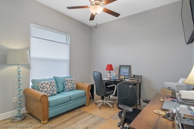 office area with ceiling fan and light wood-type flooring