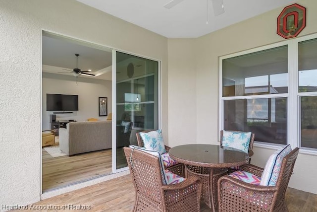 sunroom / solarium with ceiling fan