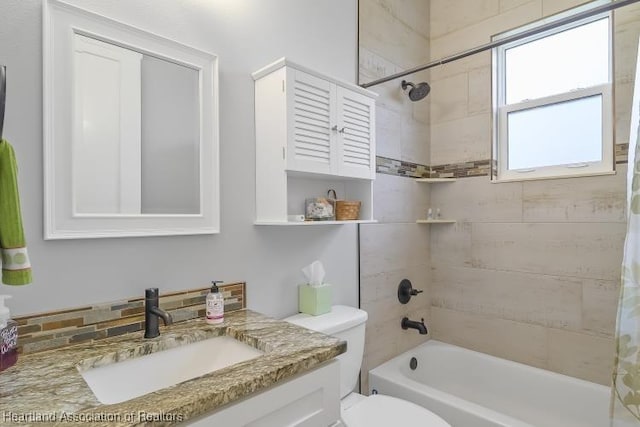 full bathroom with vanity, toilet, and shower / bath combo