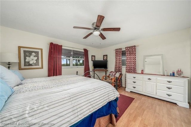 bedroom featuring ceiling fan and light wood-type flooring