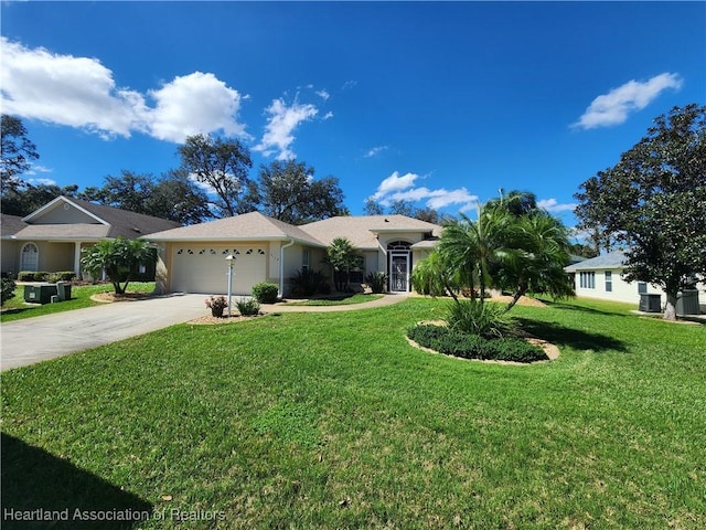 ranch-style house featuring a garage and a front yard