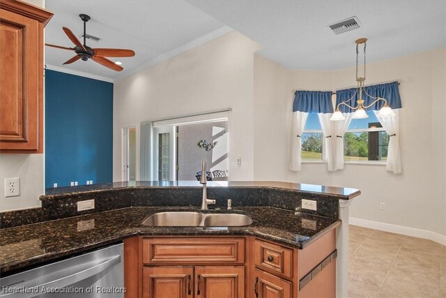 kitchen with a sink, ceiling fan, dishwasher, visible vents, and brown cabinetry