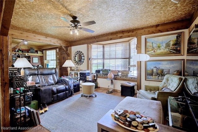 1320 Lakeview Dr, Sebring, FL 33870 - living room with a ceiling fan, wood finished floors, and wood walls