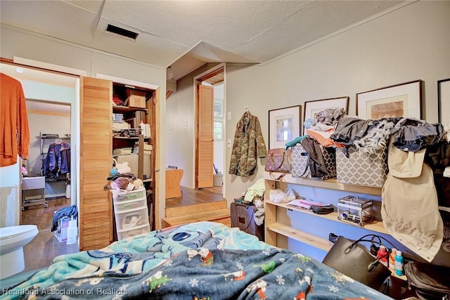 1320 Lakeview Dr, Sebring, FL 33870 - bedroom featuring wood finished floors and a closet