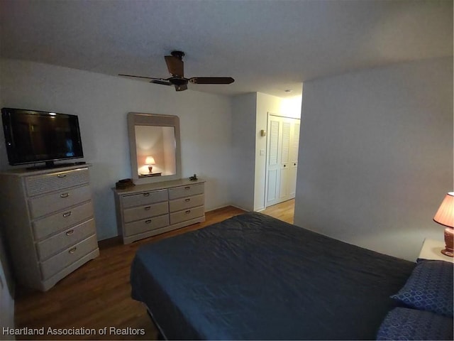160 Parkview Cir, Lake Placid, FL 33852 - bedroom with a ceiling fan and wood finished floors