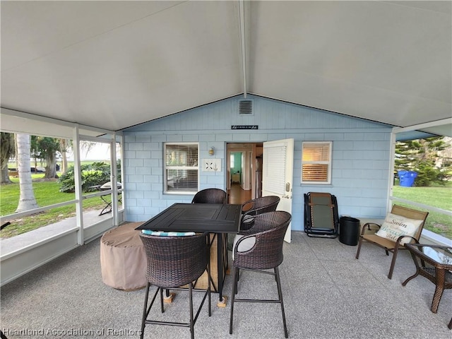 sunroom with vaulted ceiling