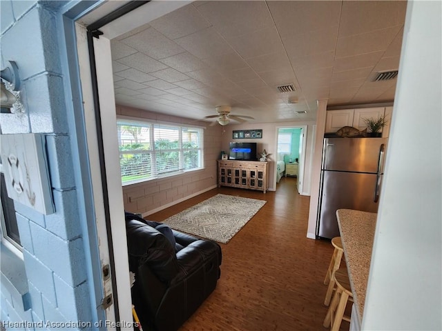living room with ceiling fan