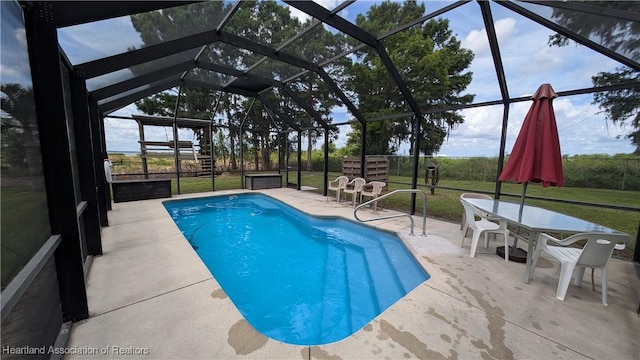 4232 Trails End Rd, Lorida, FL 33857 - swimming pool with a patio, glass enclosure, and a yard