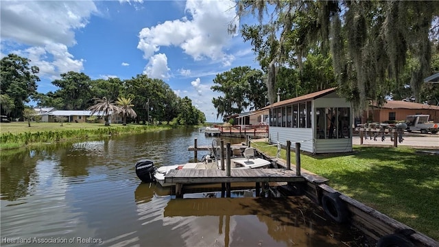 4232 Trails End Rd, Lorida, FL 33857 - dock featuring a water view and a lawn