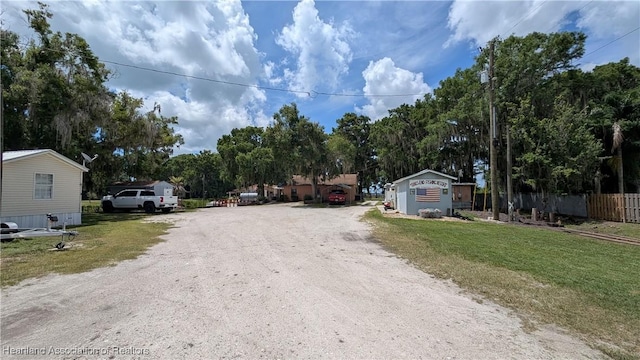 4232 Trails End Rd, Lorida, FL 33857 - view of dirt / gravel road featuring view of wooded area