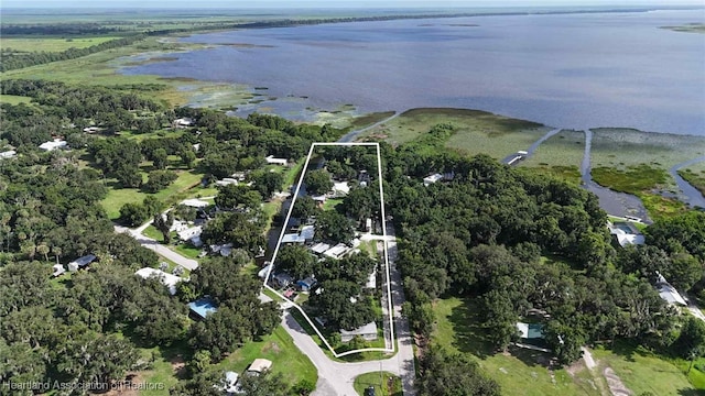 4232 Trails End Rd, Lorida, FL 33857 - aerial overview of property's location featuring a large body of water and property boundaries highlighted