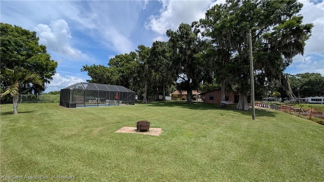 4232 Trails End Rd, Lorida, FL 33857 - view of yard featuring a fire pit, a lanai, and an outdoor pool