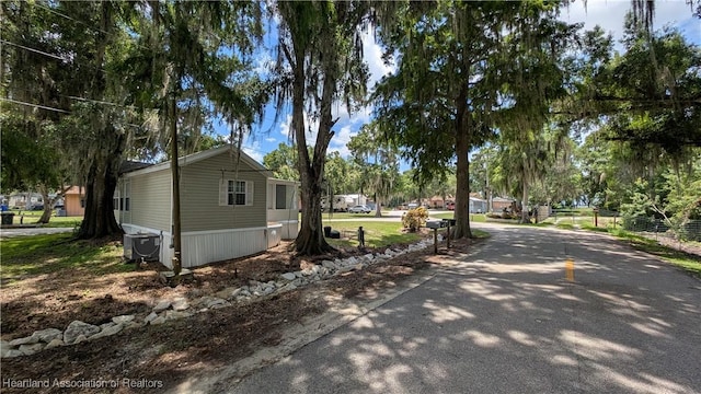 4232 Trails End Rd, Lorida, FL 33857 - view of side of property with a cooling unit