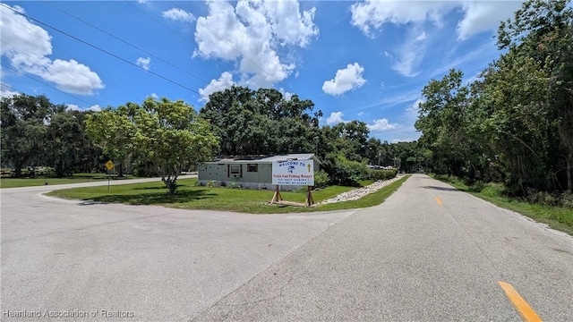 4232 Trails End Rd, Lorida, FL 33857 - view of asphalt street featuring view of wooded area