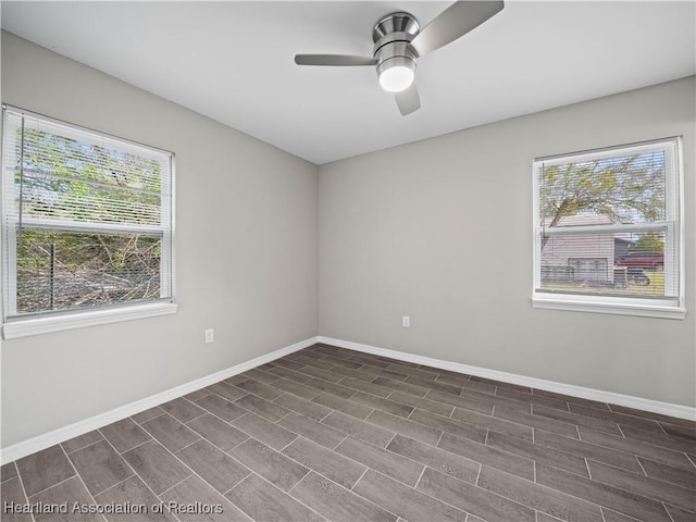 spare room featuring ceiling fan