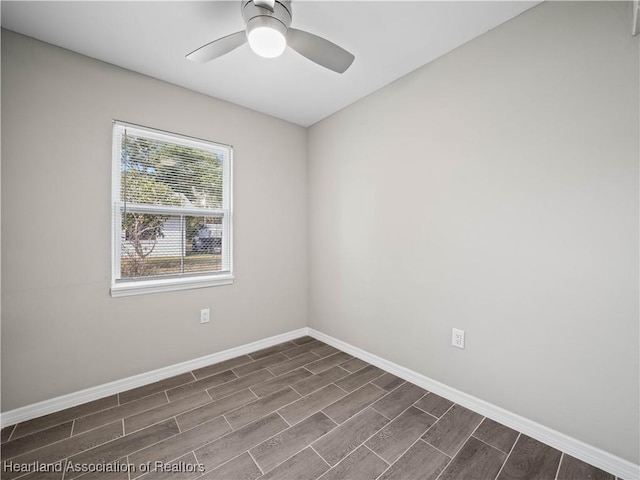 spare room with ceiling fan