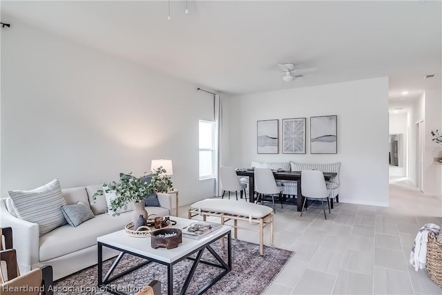 living room with ceiling fan