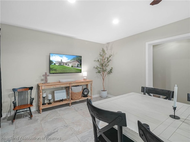 dining space with baseboards