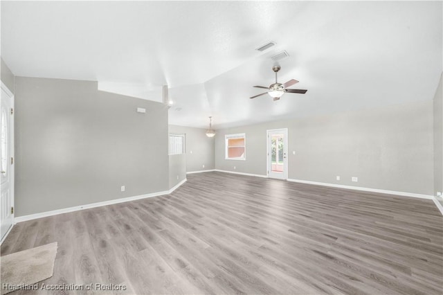 unfurnished living room featuring light wood-type flooring and ceiling fan