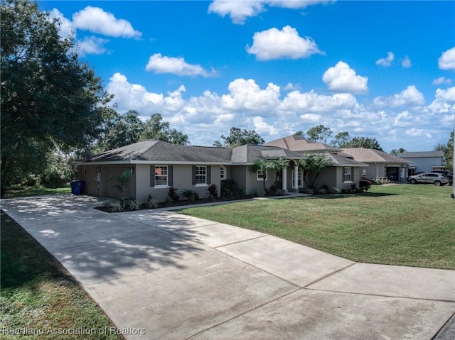 ranch-style house featuring a front lawn