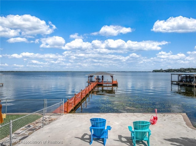 dock area with a water view