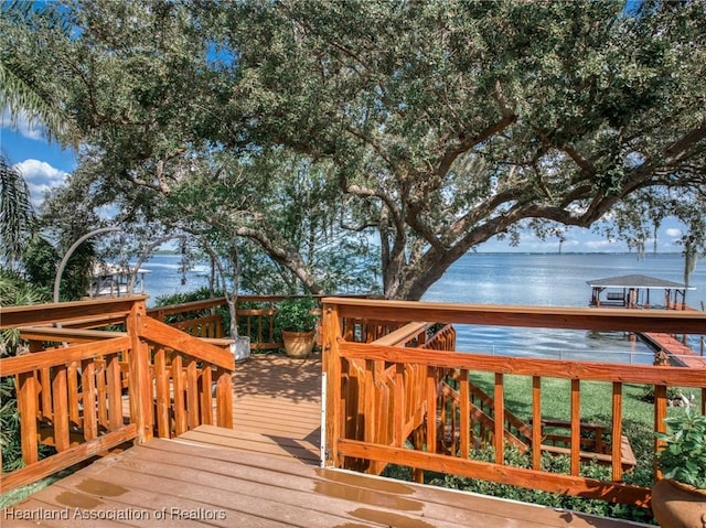 deck featuring a water view