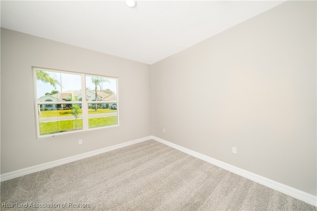 4737 Myrtle Dr, Sebring, FL 33872 - carpeted empty room with baseboards