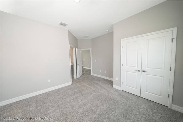 4737 Myrtle Dr, Sebring, FL 33872 - unfurnished bedroom with carpet flooring and a closet