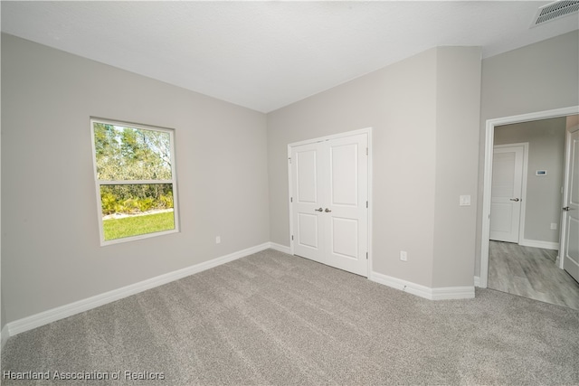 4737 Myrtle Dr, Sebring, FL 33872 - unfurnished bedroom featuring carpet and a closet