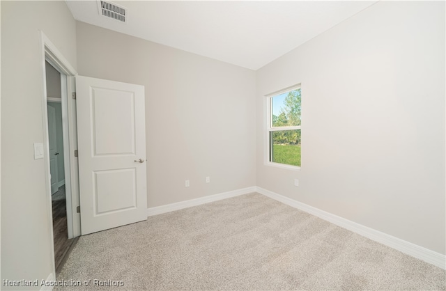 4737 Myrtle Dr, Sebring, FL 33872 - carpeted spare room featuring baseboards