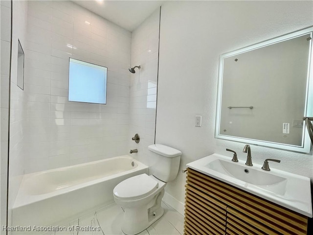 full bathroom with toilet, tile patterned flooring,  shower combination, and vanity