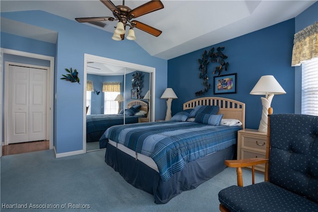 3195 E Pebble Dr, Avon Park, FL 33825 - carpeted bedroom with multiple windows, a closet, vaulted ceiling, a ceiling fan, and baseboards