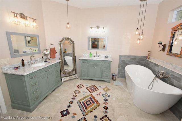 bathroom with vanity and a bathtub