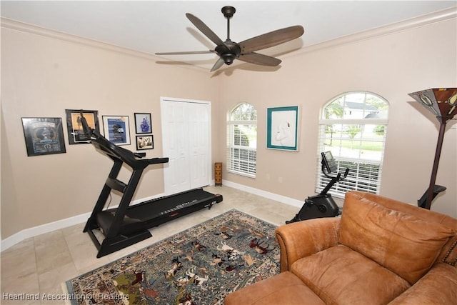 workout room featuring ceiling fan, ornamental molding, and light tile patterned floors