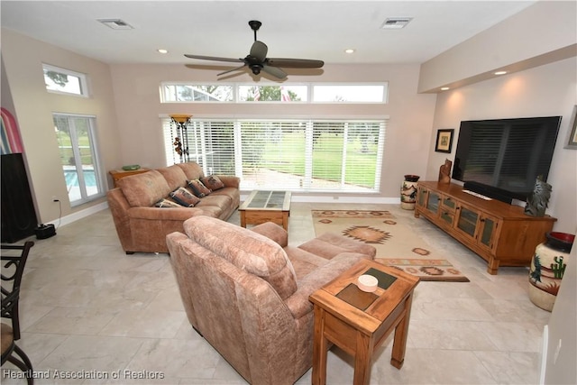 living room with ceiling fan