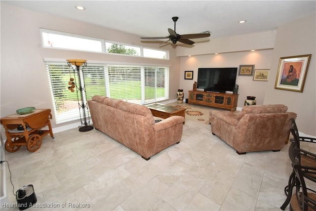 living room with ceiling fan