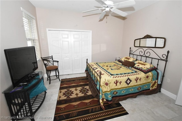 bedroom with a closet and ceiling fan