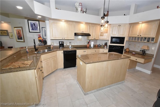 kitchen with pendant lighting, sink, dark stone counters, and black appliances