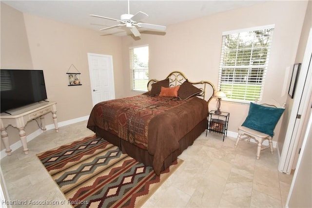 bedroom featuring ceiling fan