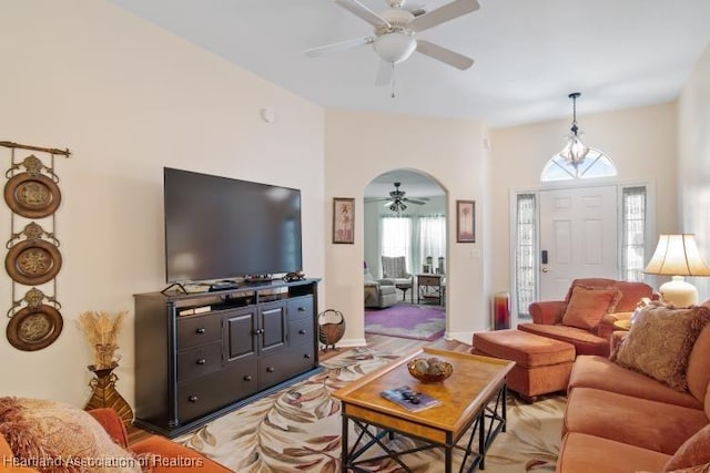 2033 Ashley Oaks Cir, Sebring, FL 33870 - living area featuring a ceiling fan and arched walkways