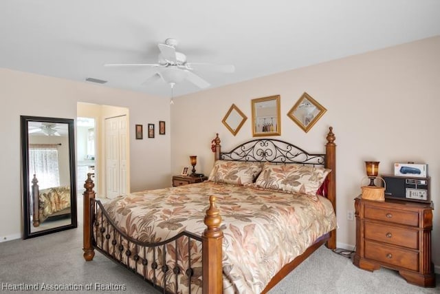 2033 Ashley Oaks Cir, Sebring, FL 33870 - carpeted bedroom featuring baseboards, a closet, a ceiling fan, and visible vents