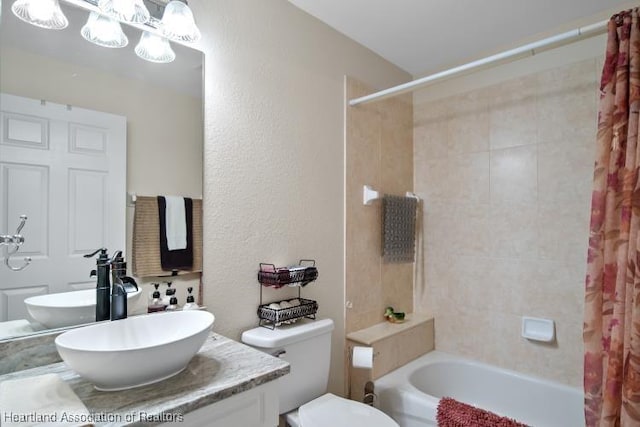 2033 Ashley Oaks Cir, Sebring, FL 33870 - bathroom with toilet, shower / tub combo with curtain, vanity, and a textured wall