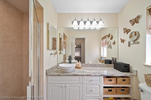 2033 Ashley Oaks Cir, Sebring, FL 33870 - full bathroom featuring a tile shower, vanity, and toilet