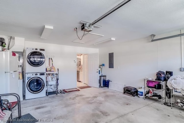 2033 Ashley Oaks Cir, Sebring, FL 33870 - garage featuring freestanding refrigerator, stacked washer and clothes dryer, electric panel, and a garage door opener