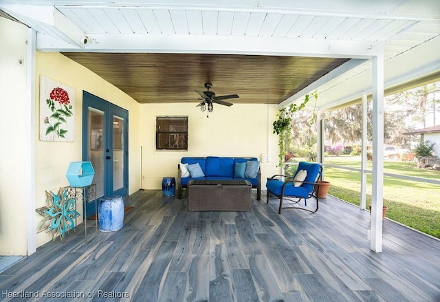 view of patio / terrace with an outdoor living space and french doors