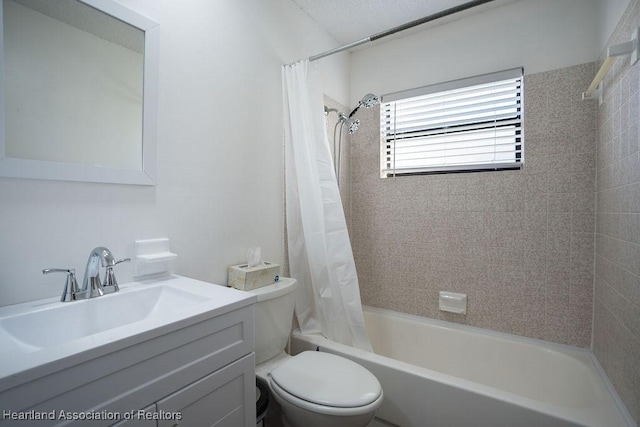 full bathroom with shower / bath combo, vanity, and toilet