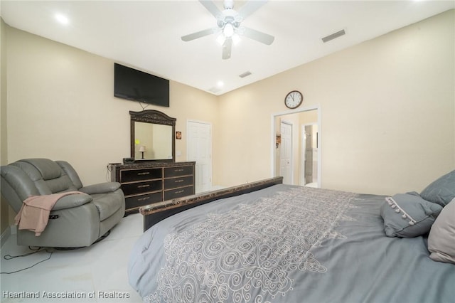 carpeted bedroom with vaulted ceiling and ceiling fan