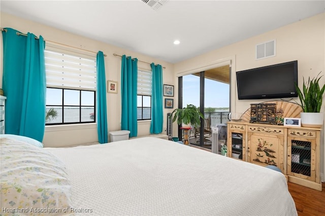 2351 Lakeview Dr Unit 219, Sebring, FL 33870 - bedroom featuring access to outside, multiple windows, wood finished floors, and recessed lighting
