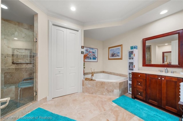 2351 Lakeview Dr Unit 219, Sebring, FL 33870 - bathroom featuring vanity, a garden tub, a shower stall, crown molding, and recessed lighting